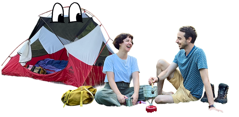 nica and chris in front of their tent