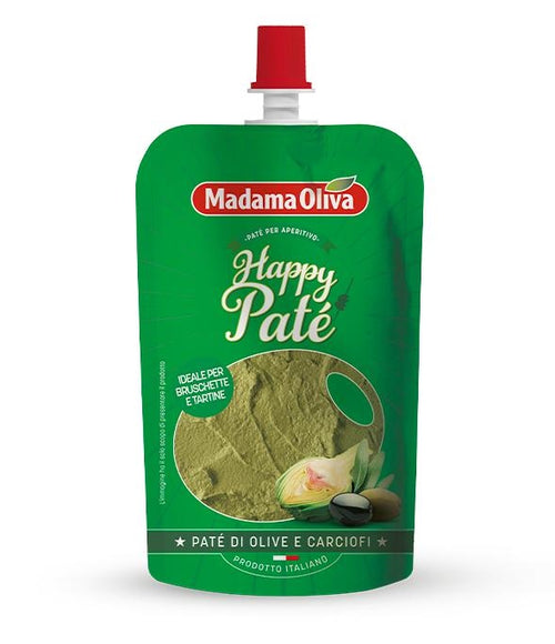 A green stand-up pouch of Artichoke olive paté with a red flip-top cap, shown on a plain white background. The front label features the brand name, product name, and a photo of olive paste with garlic and lemon.
